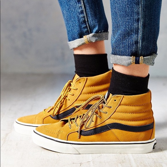 yellow and black high top vans
